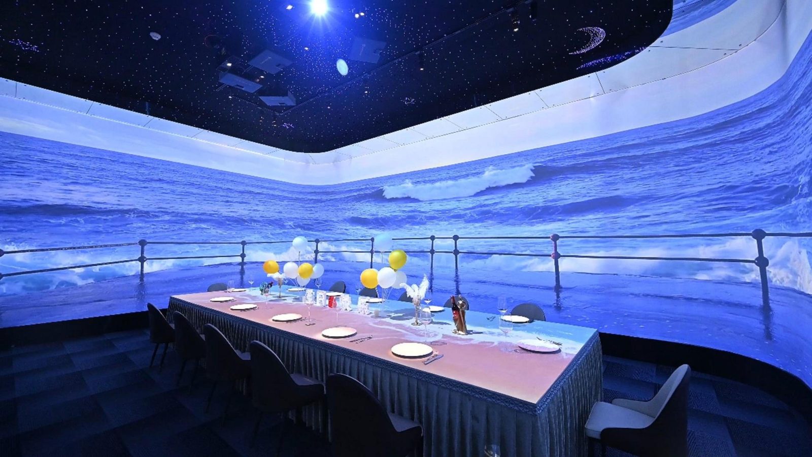 Full-wrap banquet hall with starry dome and wave walls around a long table