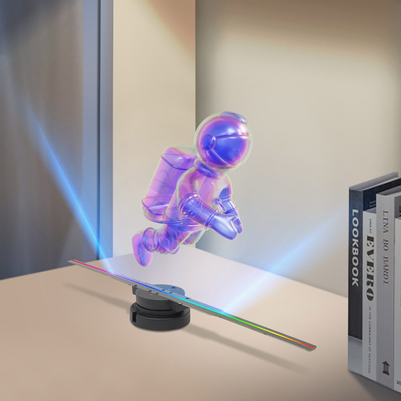 Hologram fan projecting a glowing 3D astronaut above a table